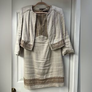 Tan sleeveless dress with matching jacket